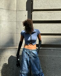 Photo by Megan Ria on June 19, 2024. May be an image of 1 person and fishnet stockings..jpg